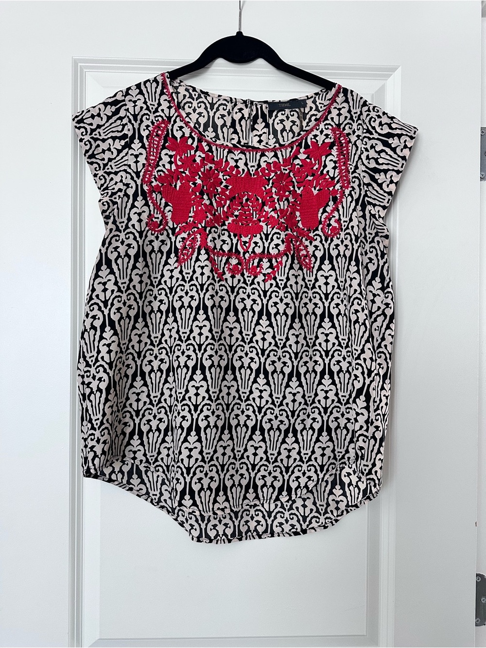 Black & White Patterned Cap-Sleeve Top with Red Embroidery
